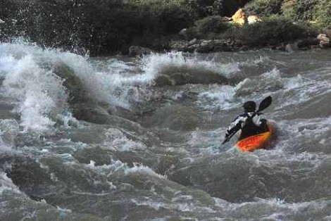 Danny facing off another huge surging wave on the grade 2