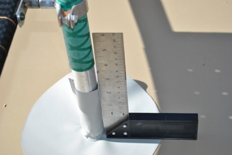 Using a set square to ensure mast, mast foot and clamp are all aligned