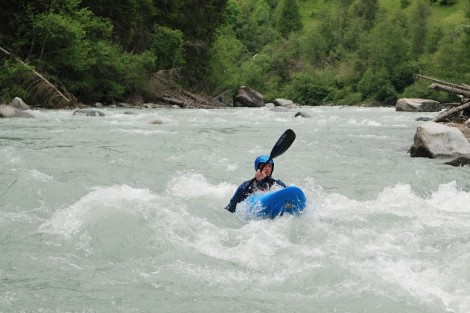Nick applies even blade pressure as he rides over a wave in Switzerland.