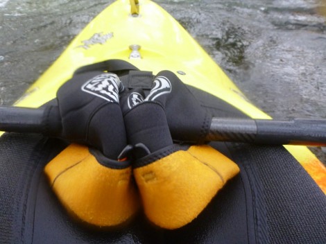 Palm Neo Mitts pushed to the middle of the paddle shaft
